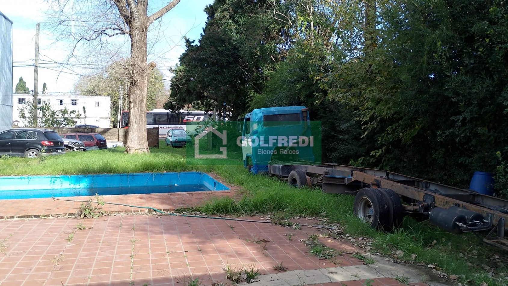 Terreno con casa a reciclar