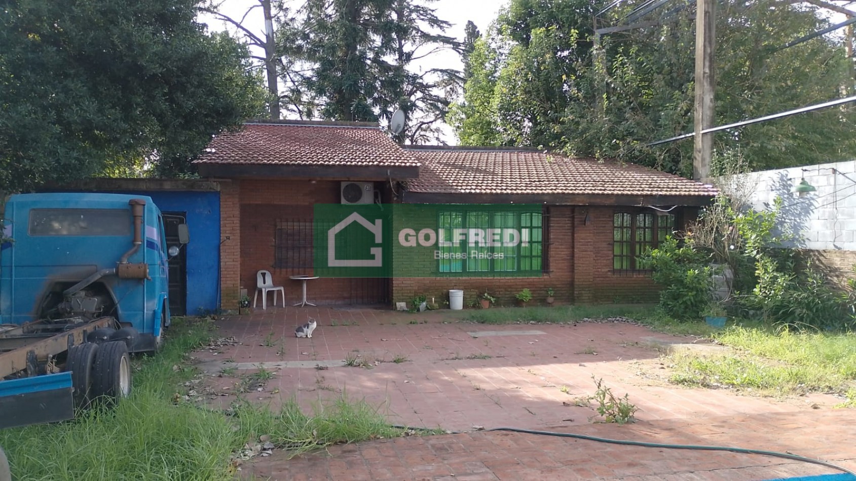 Terreno con casa a reciclar