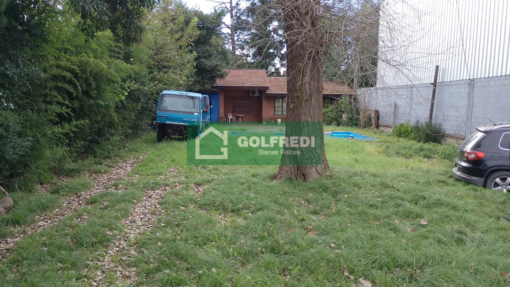 Terreno con casa a reciclar