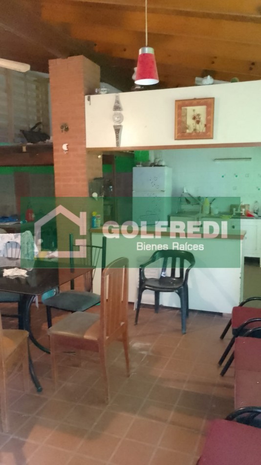 Terreno con casa a reciclar