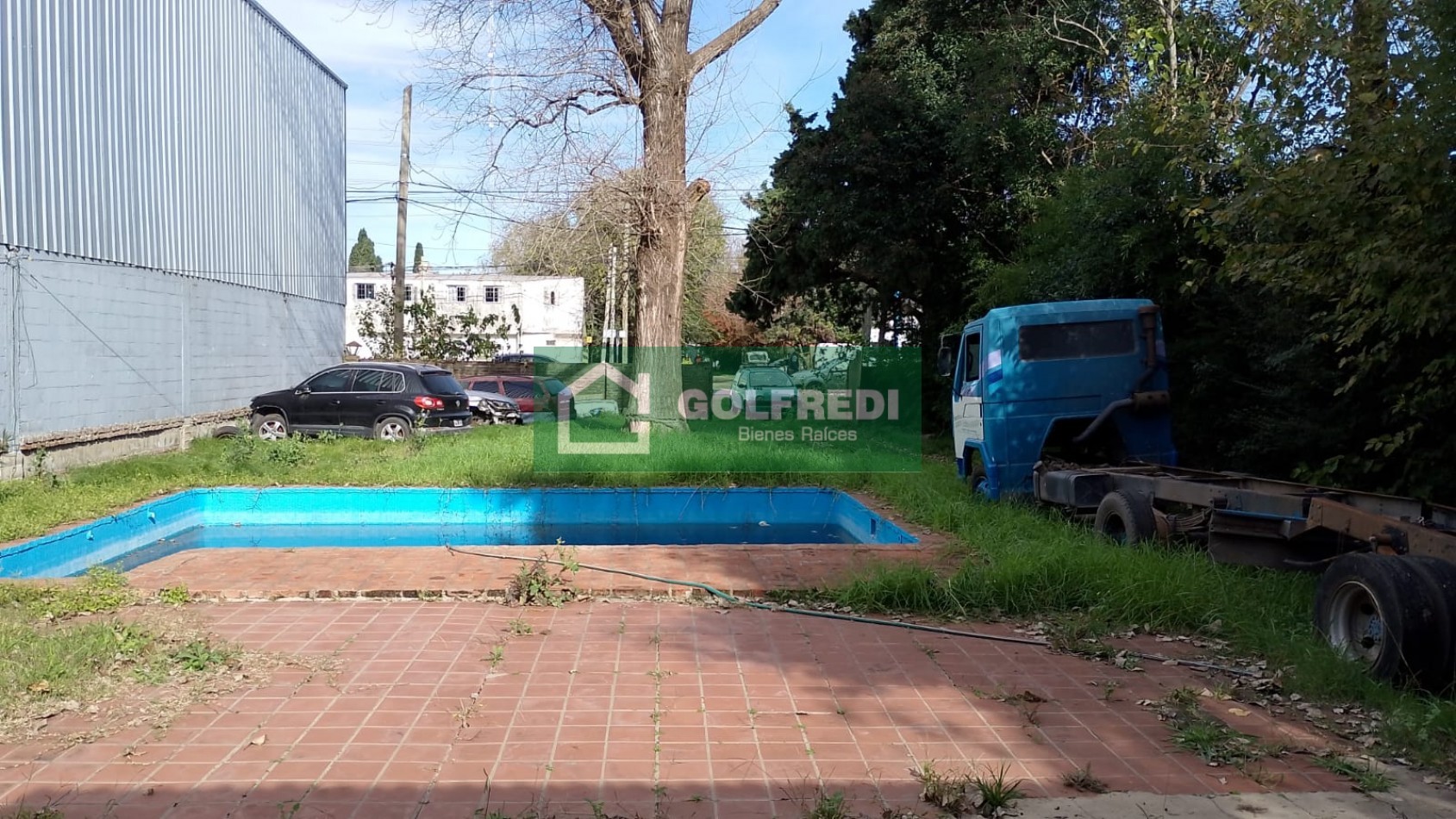 Terreno con casa a reciclar