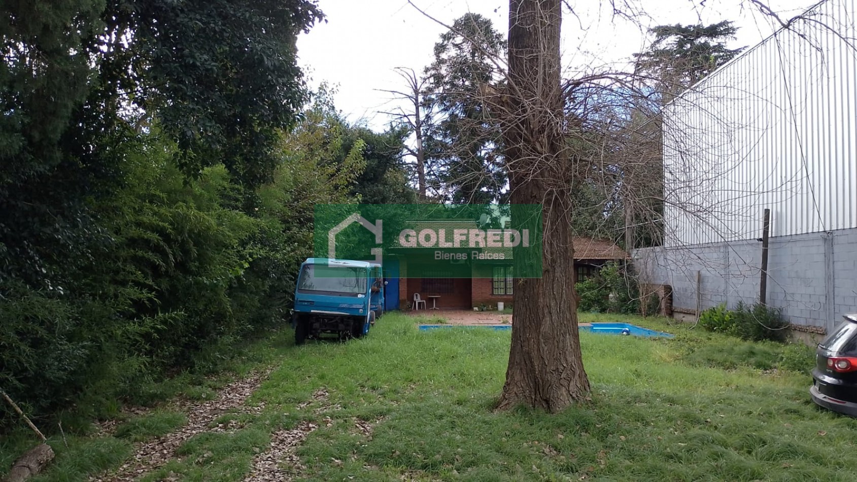 Terreno con casa a reciclar