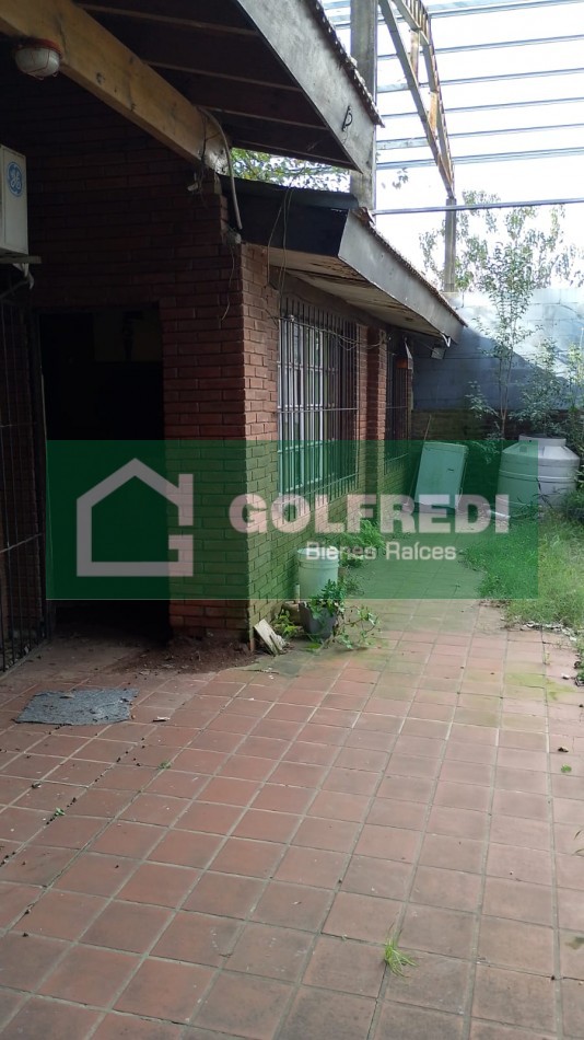 Terreno con casa a reciclar