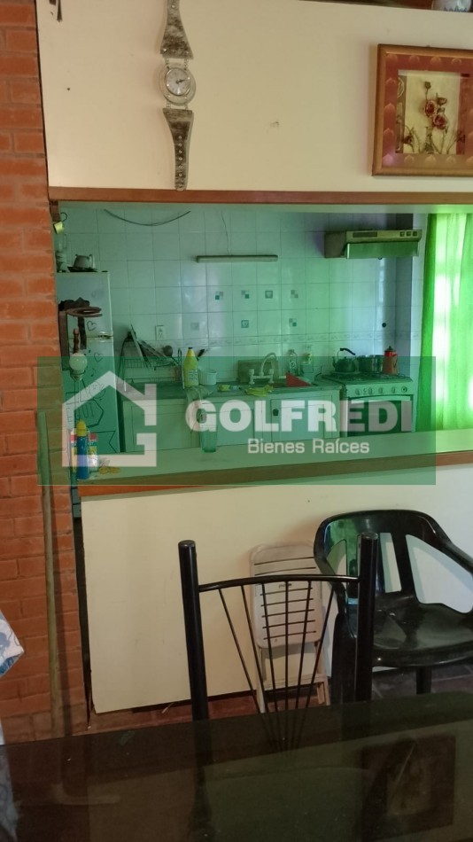 Terreno con casa a reciclar