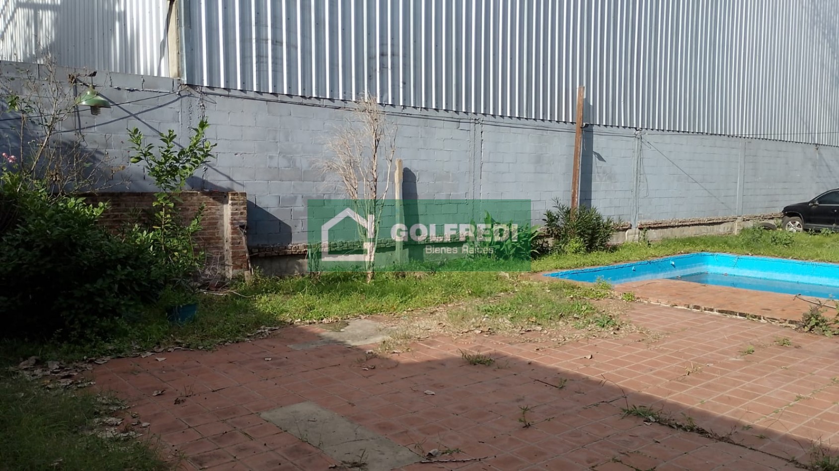 Terreno con casa a reciclar
